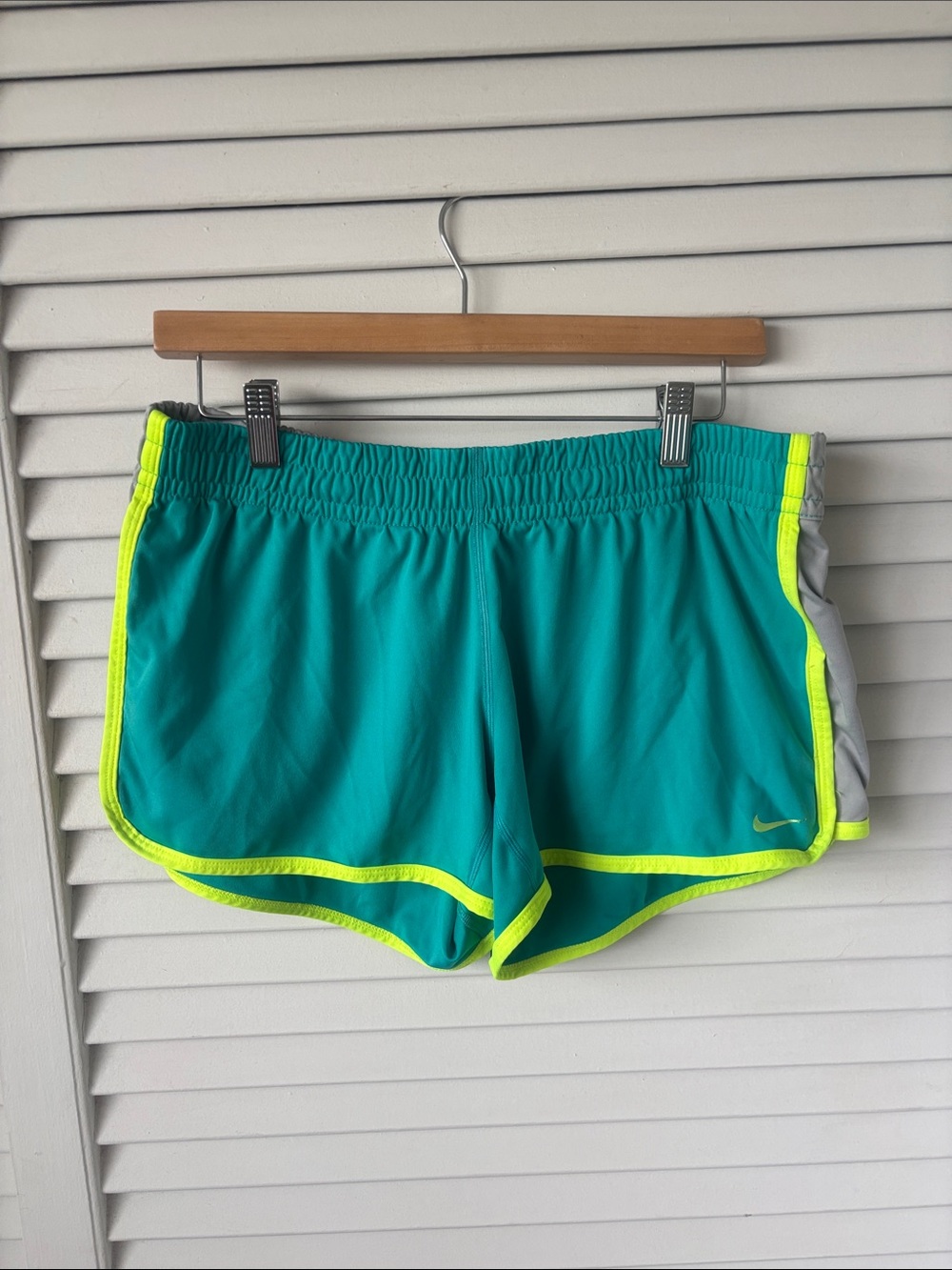 Nike Women's Teal Athletic Shorts with Neon Yellow Trim